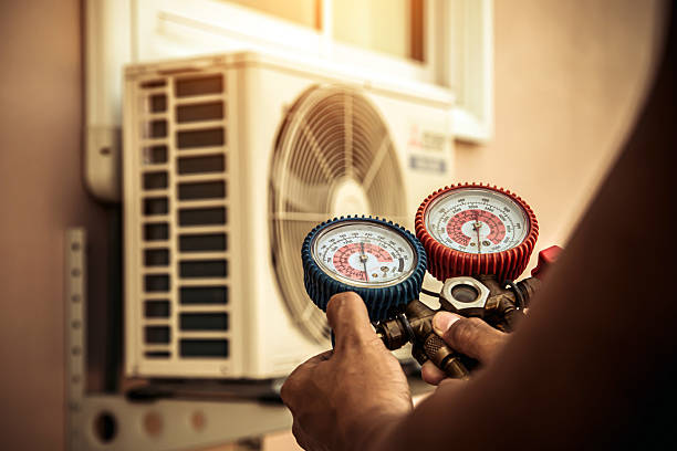 Professional Air Conditioning Service technician working in Colton, OR